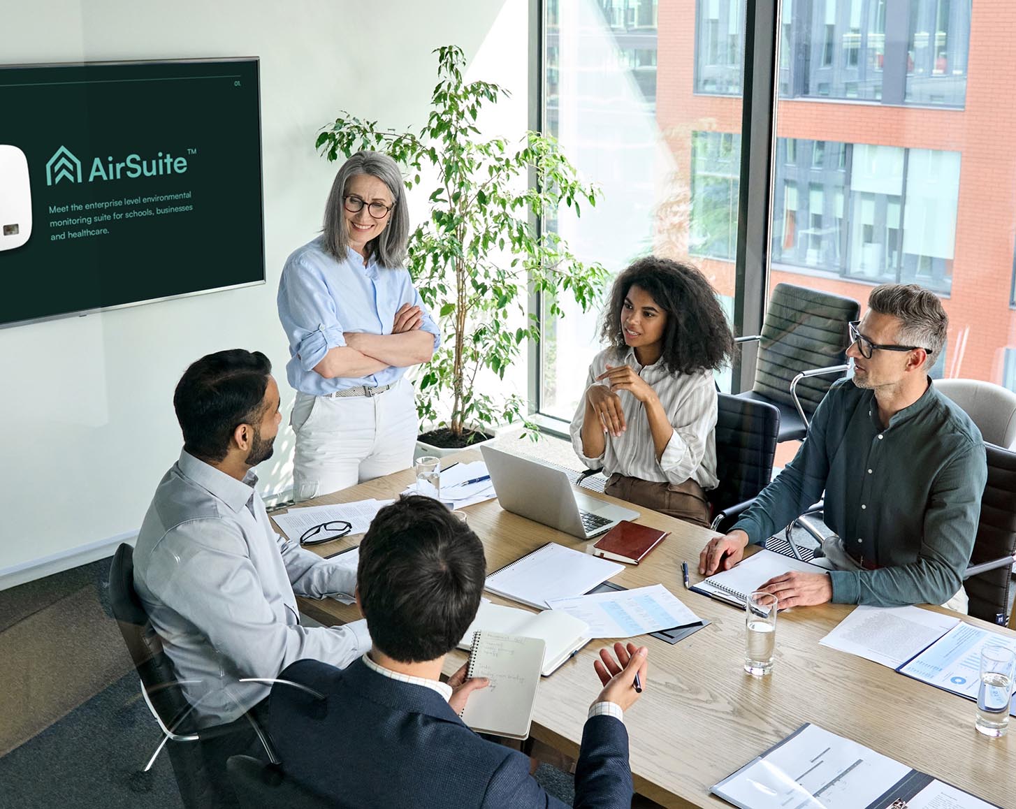 A group of people at a conference table