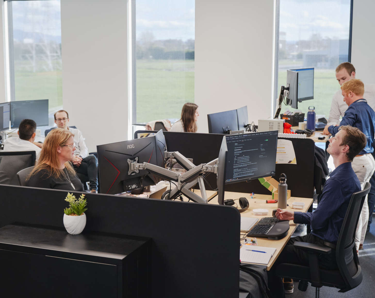 The AirSuite team at work in their office